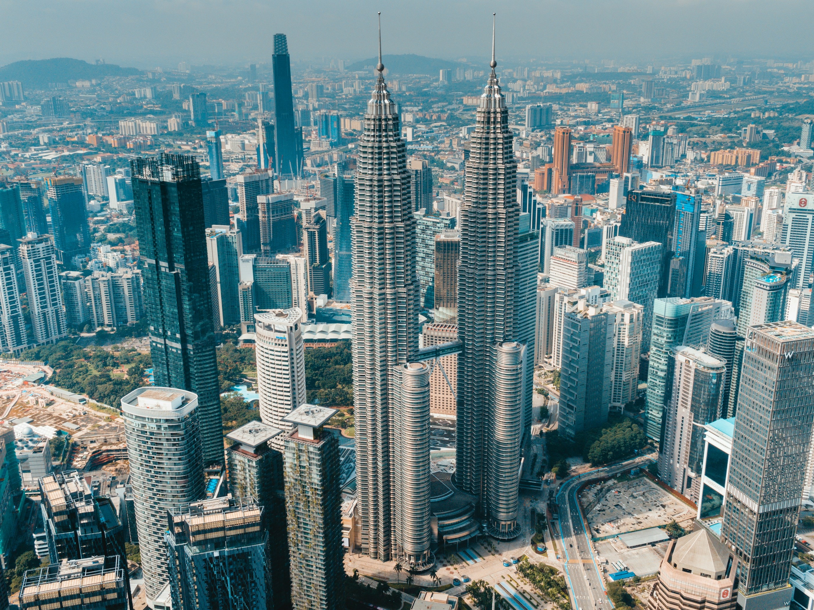 Aerial view of the Kuala Lumpur city skyline in daylight
